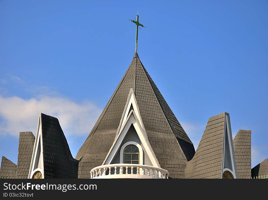 Roof of church building under sky