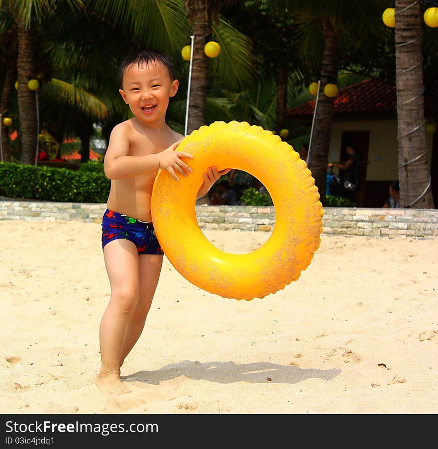 Asian Boy At Beach