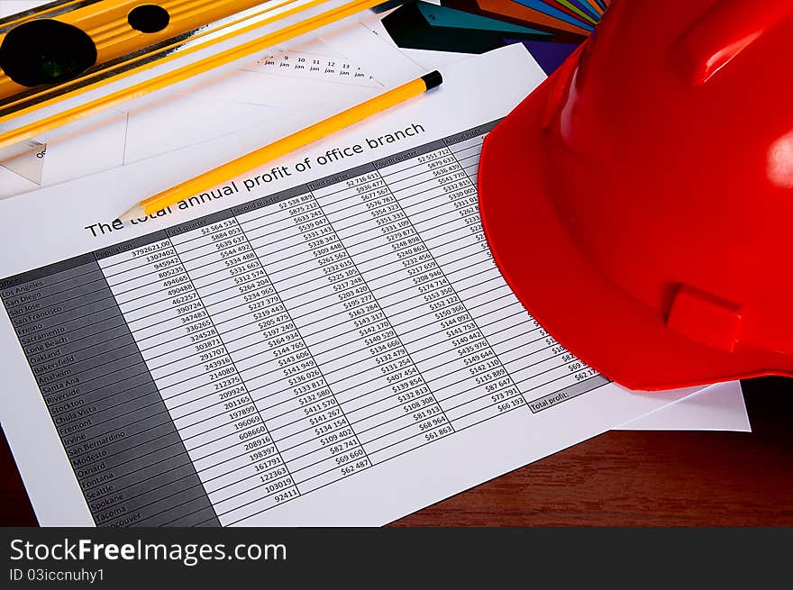 Helmet, Level, Pencil, Briefs On A Table