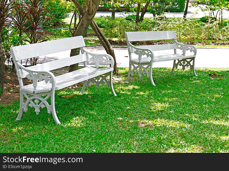 White Bench In The Garden