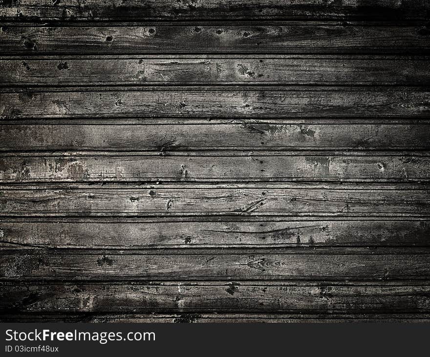 Black wooden planking closeup background. Black wooden planking closeup background.