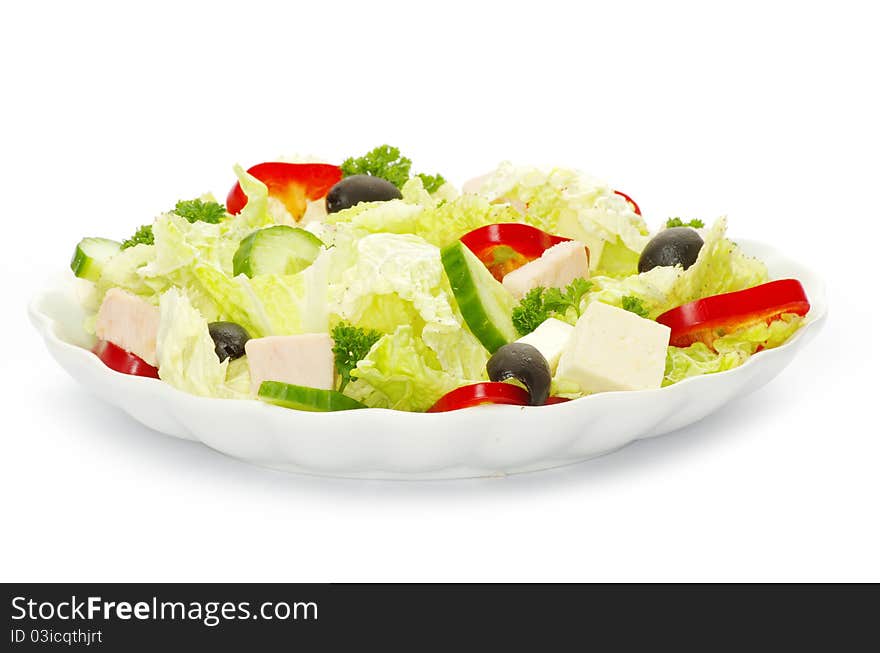 Salad in plate on white