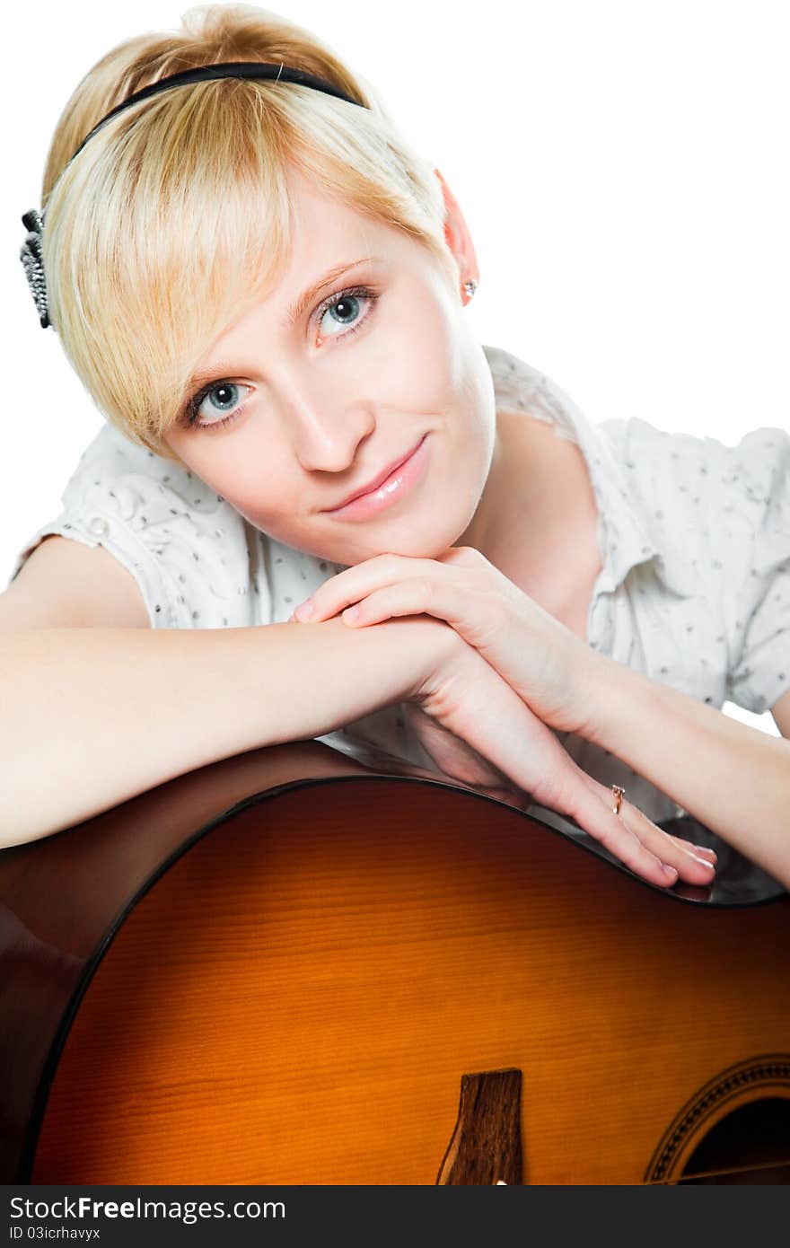 Blond woman with guitar on isolated white