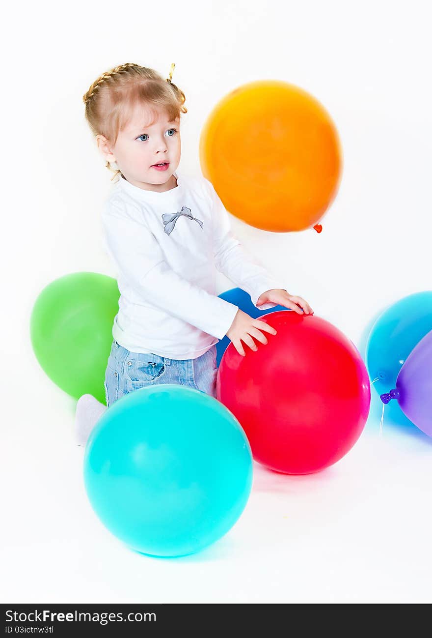 The girl catches balloon