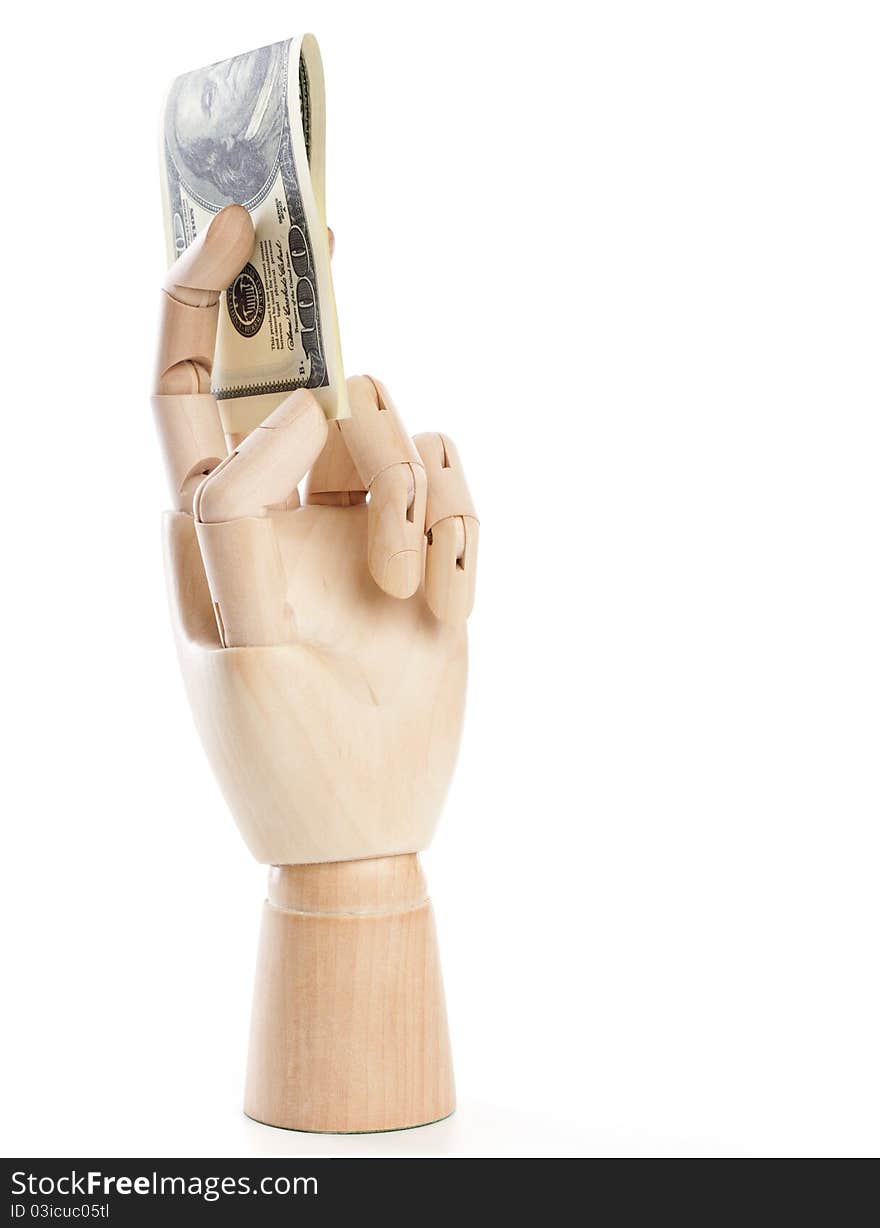 A wooden hand with dollars