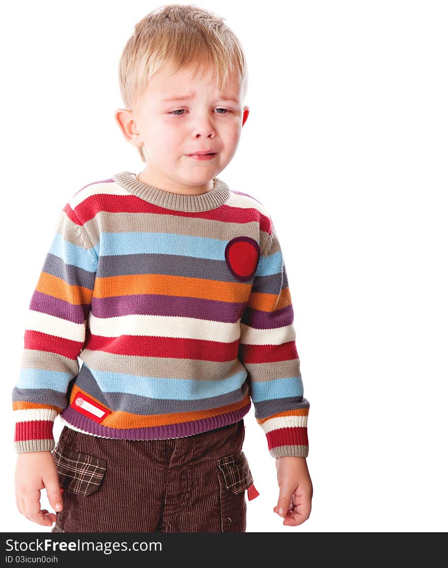 A crying boy. Isolated on a white background