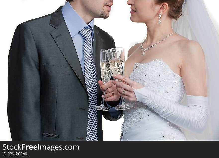 Happy bride and groom toasting with champagne. Happy bride and groom toasting with champagne