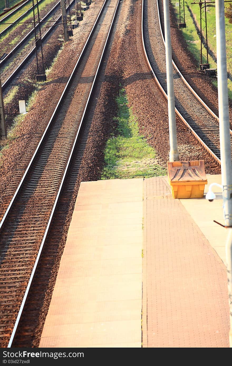 Pavement brown and railroad track. Pavement brown and railroad track