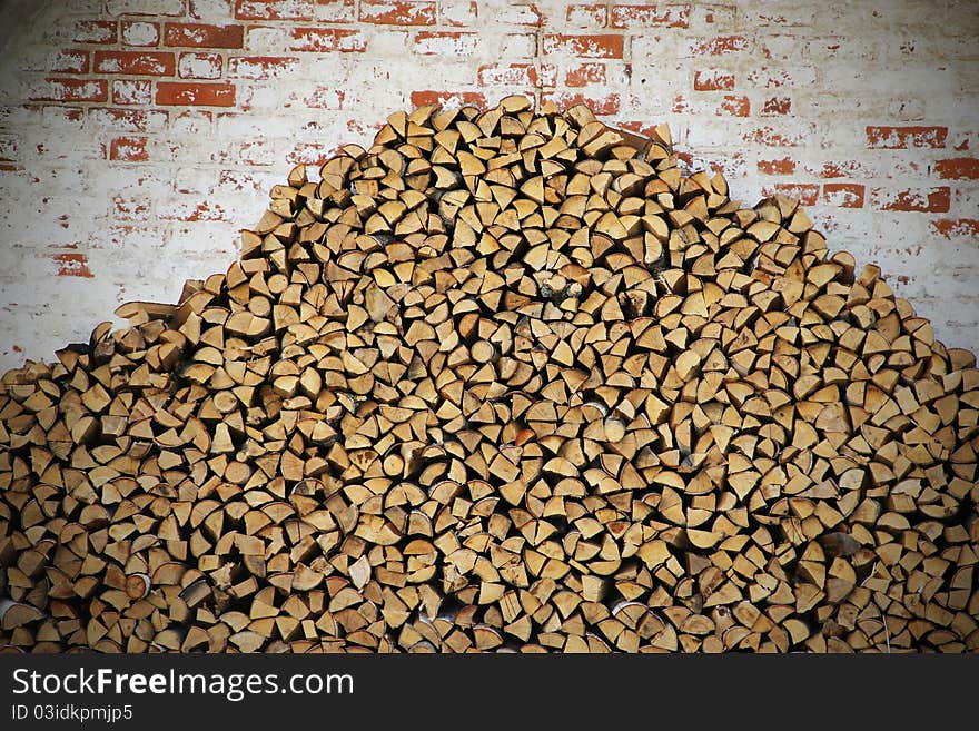 Wood stack pile of firewood background