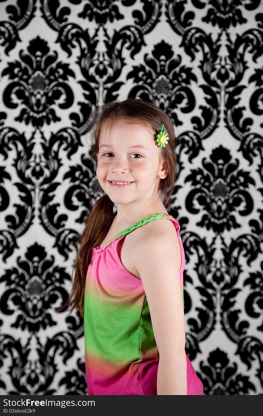 Portrait of cute girl over the black & white background