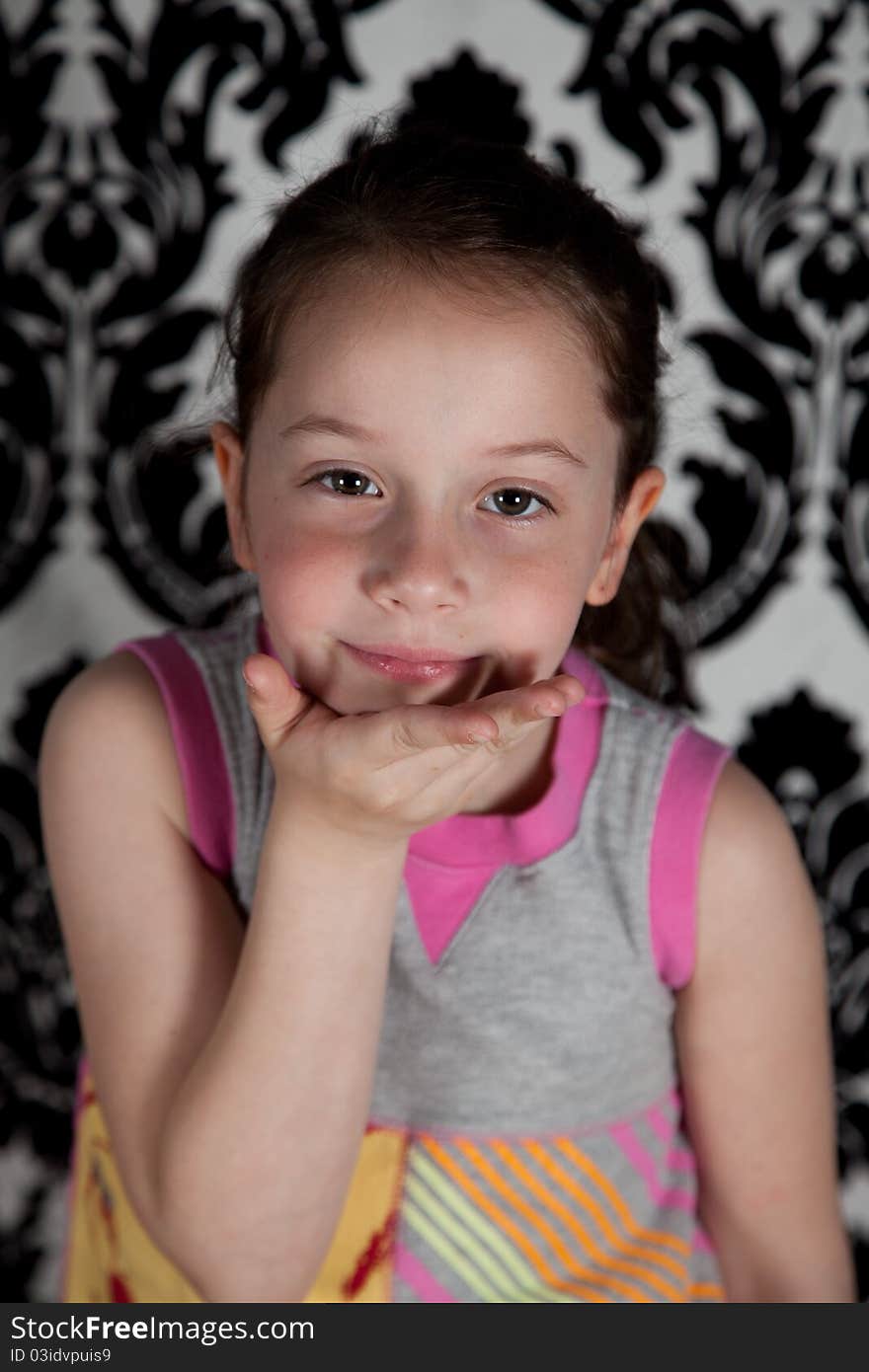 Portrait of cute girl over the black & white background