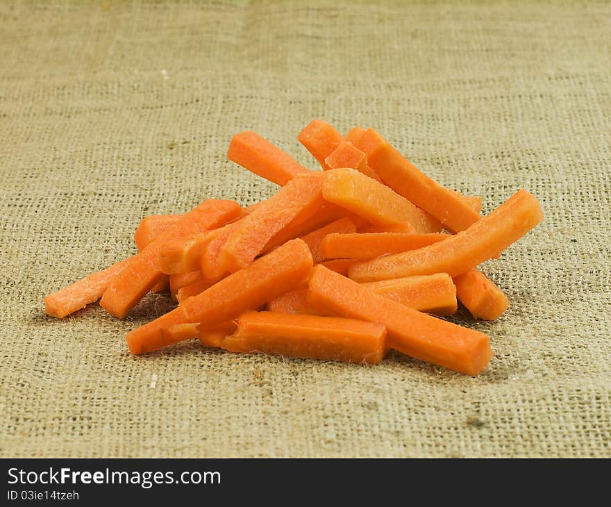 Organic nice sliced carrots on dark background. Organic nice sliced carrots on dark background