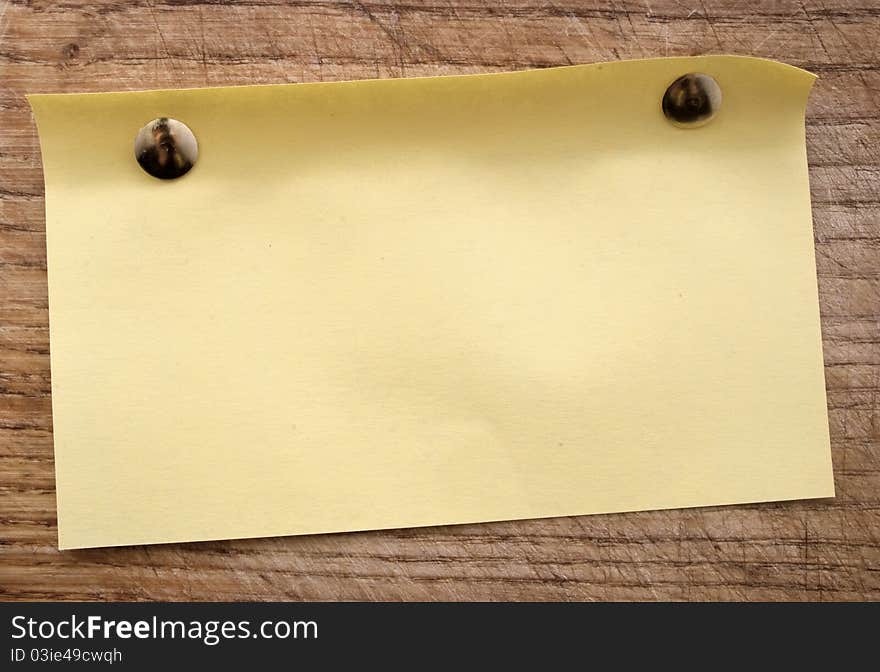 Yellow blank page sketch book on wood table