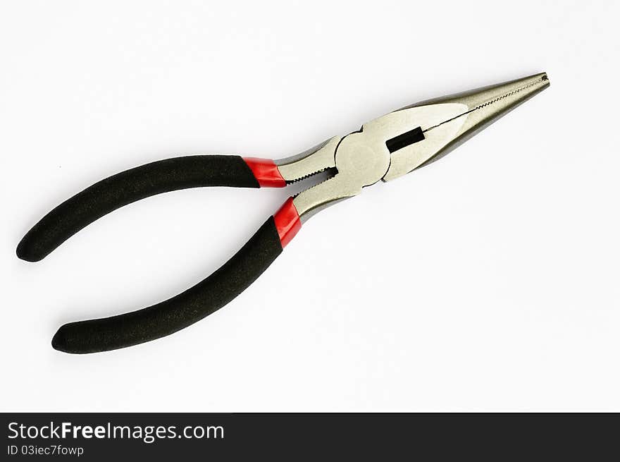 Closeup of long nose pliers - studio isolated on white