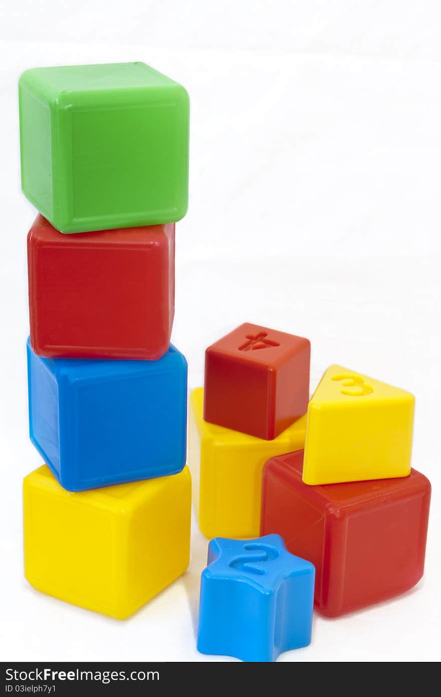 This photograph shows cubes on a white background.