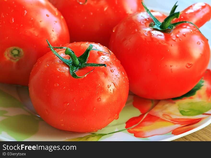 Fresh, red tomatoes for a plate