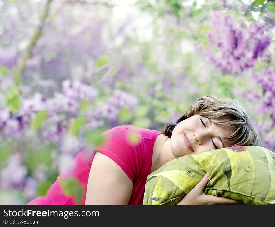 Yoing woman relaxing in nature. Yoing woman relaxing in nature