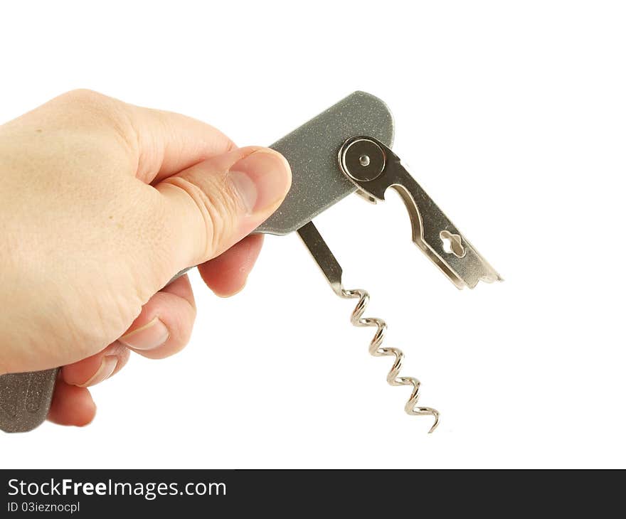 Someone holding a bottle opener, isolated towards white