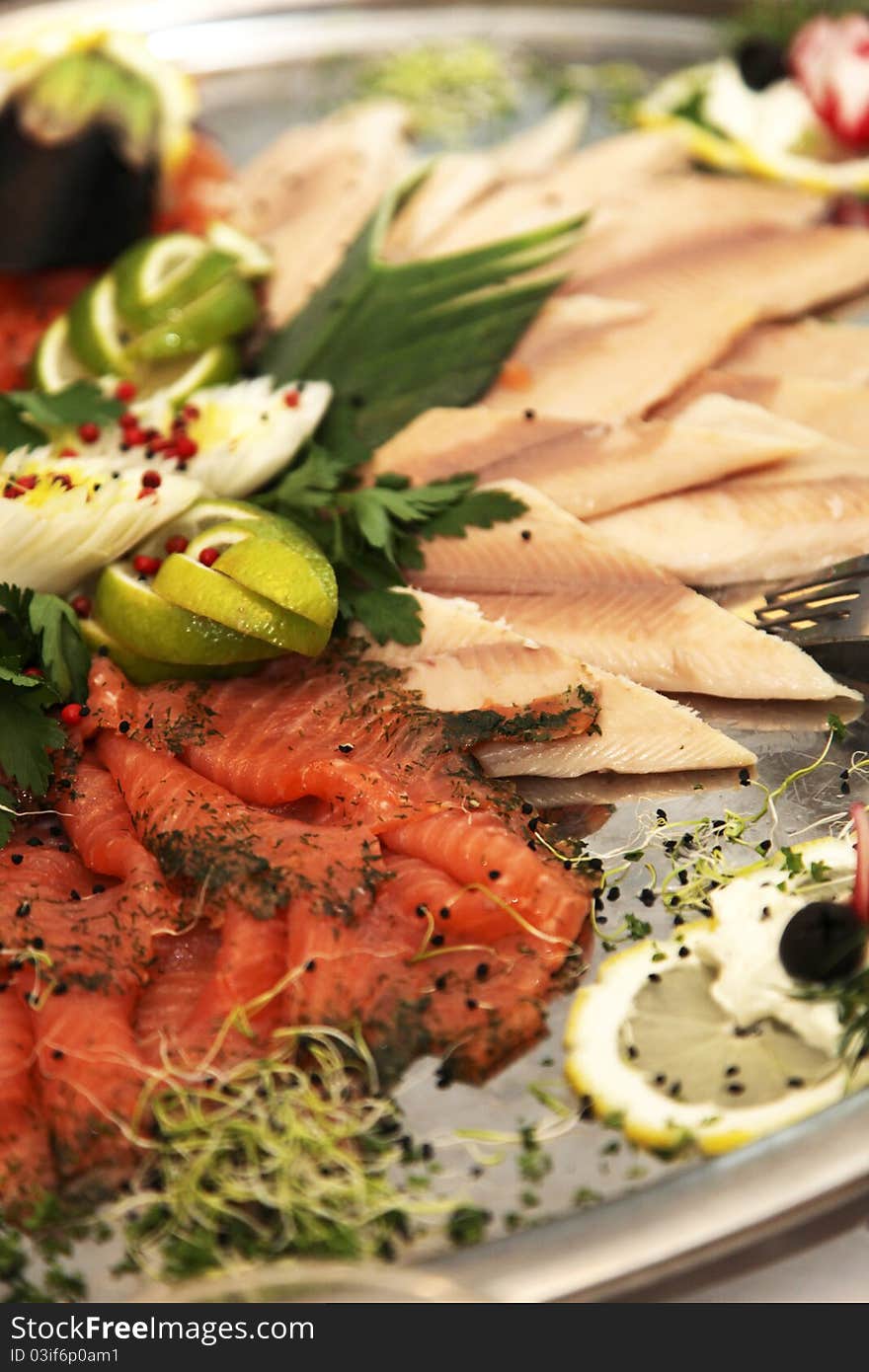 Fish plate with different kinds of fish - close up - decorated from top