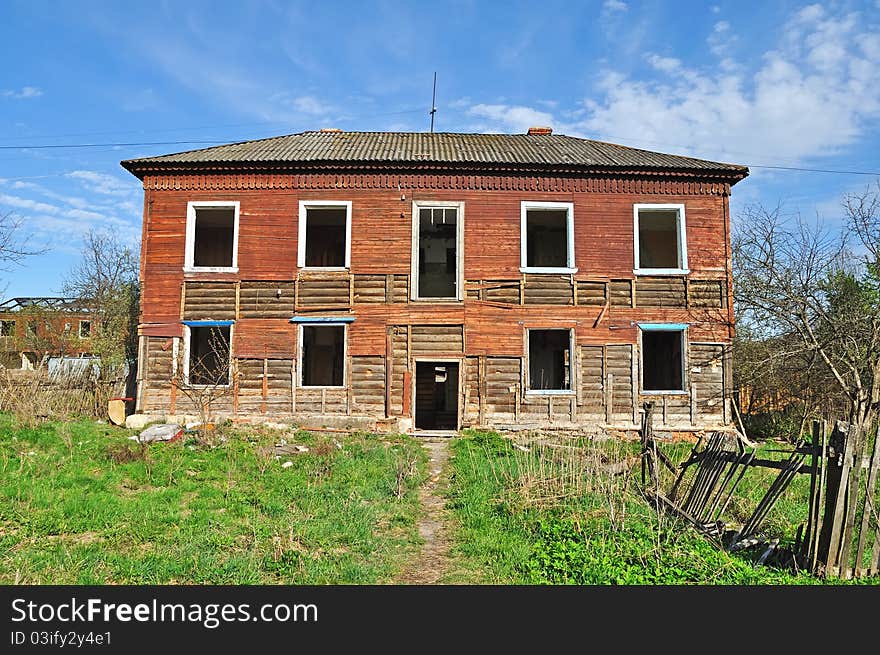 Facade of old destroyed wooden house. Facade of old destroyed wooden house