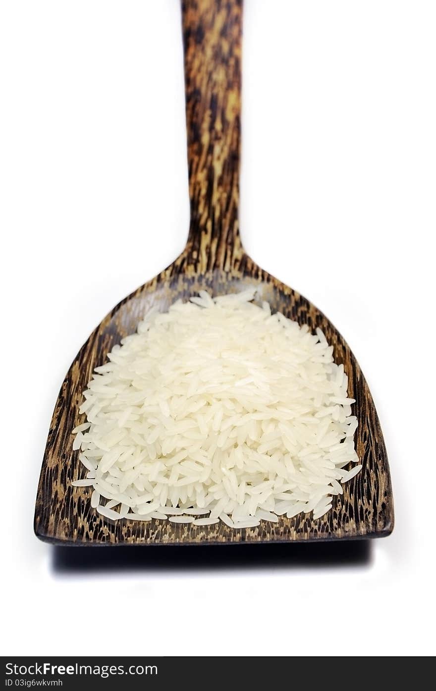 Rice In Wooden Spoon