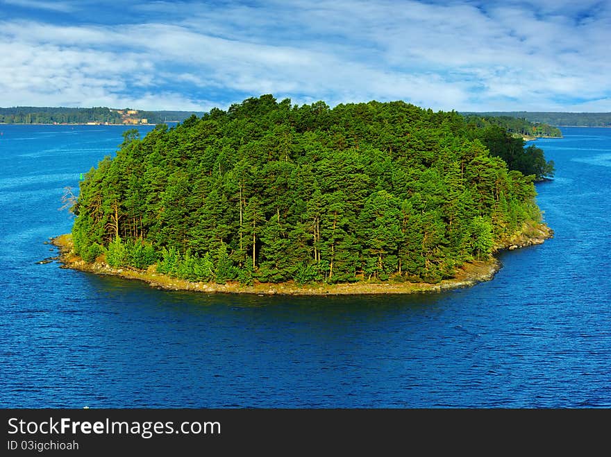 Picturesque landscape with island.