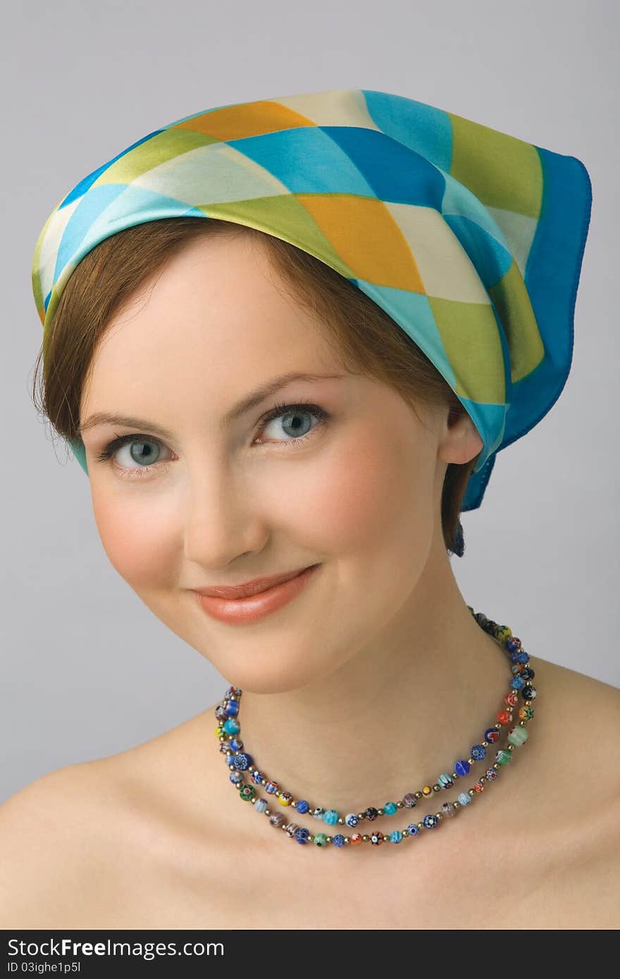 Portrait Of The Young Girl In Kerchief And Beads