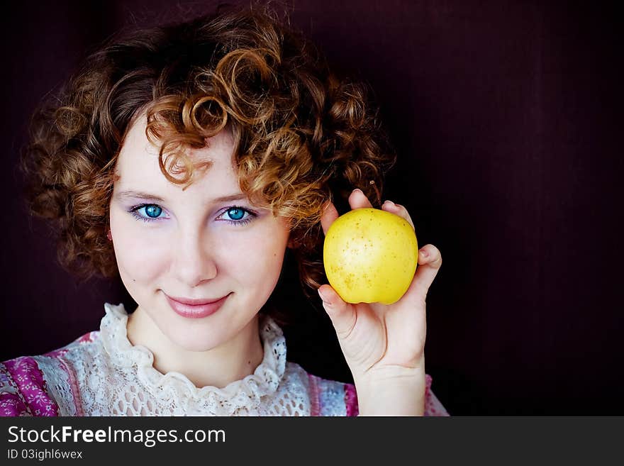 Portrait of beautiful girl in colored dress