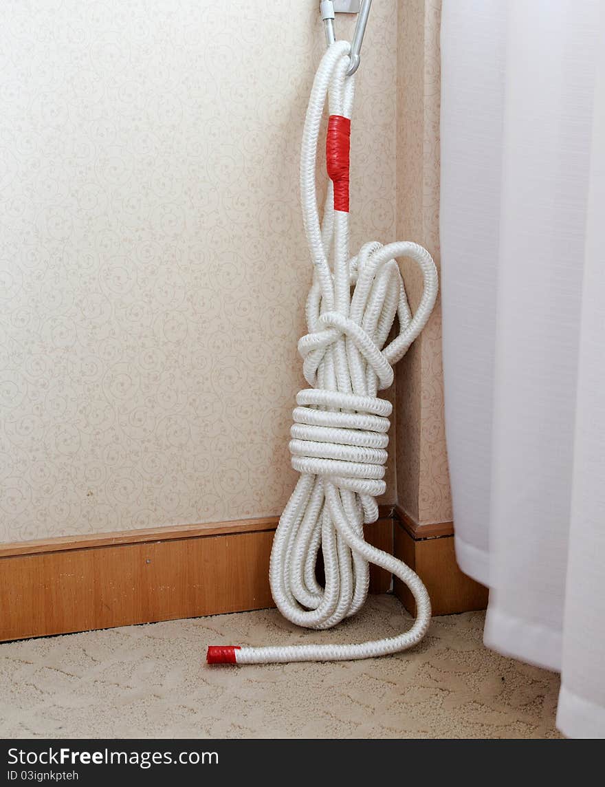 Emergency rescue rope in a room