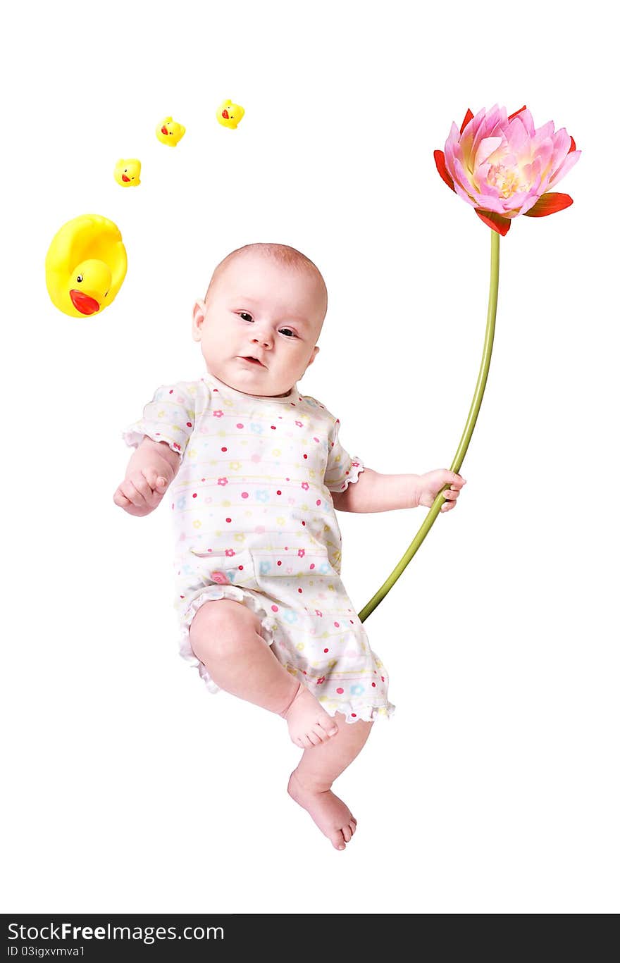 A baby with a big flower and some toy ducks isolated on the white background. A baby with a big flower and some toy ducks isolated on the white background