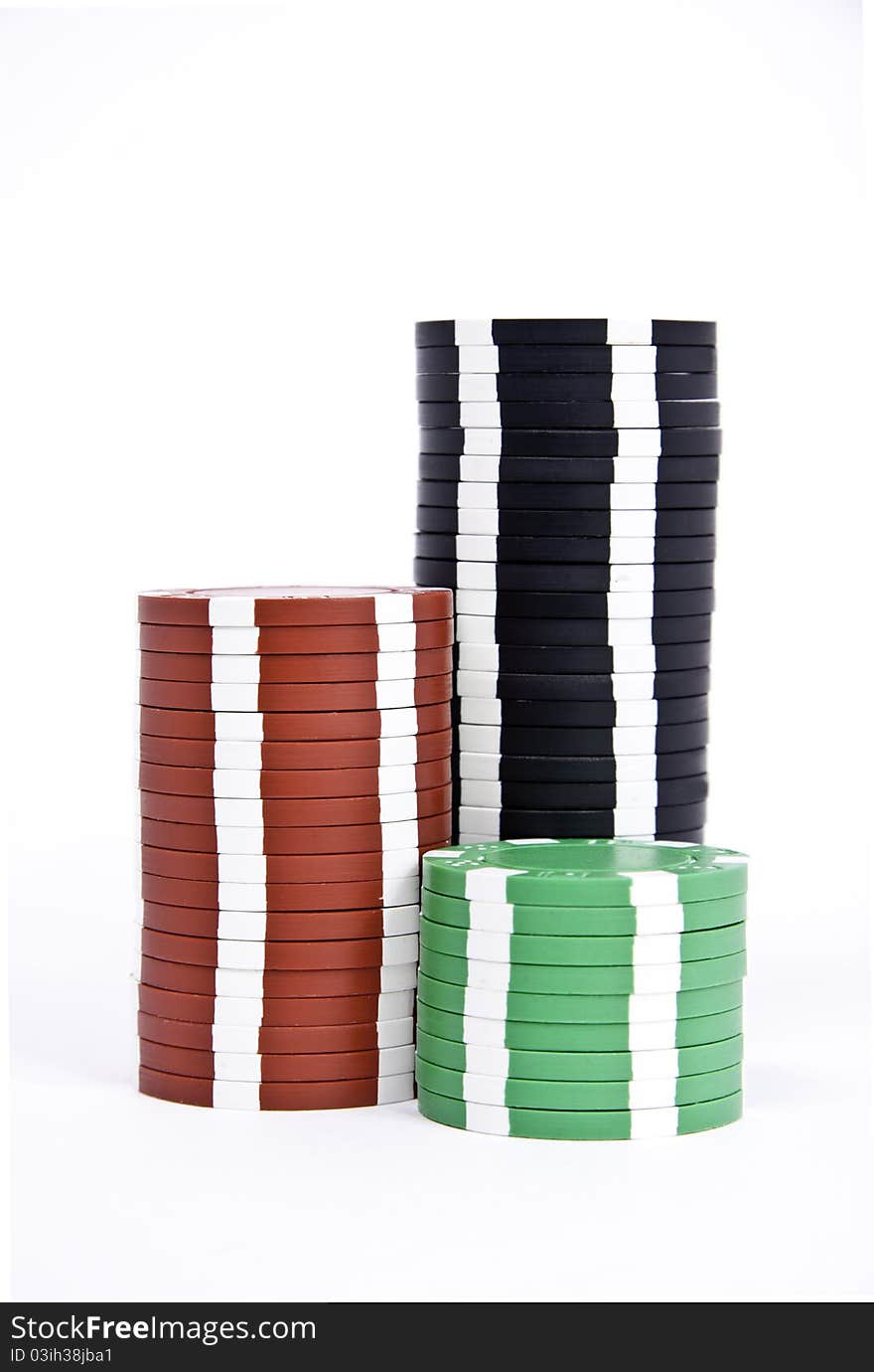 Black red and green gambling chips isolated on white. Black red and green gambling chips isolated on white