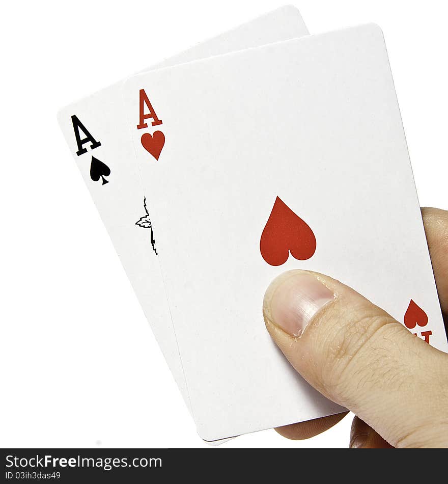 A pair of aces with a hand isolated on white