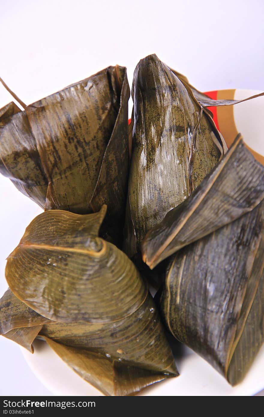 ZongZi is a traditional Chinese food.Every Chinese family will eat ZongZi to celebrate Dragon Boat Festival also called ZongZi Festival.