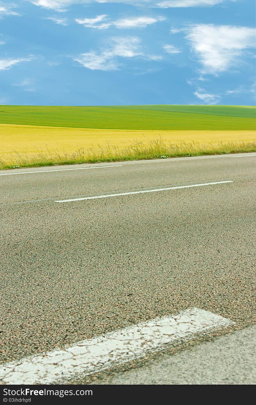 Landscape with road, fields and sky. Landscape with road, fields and sky