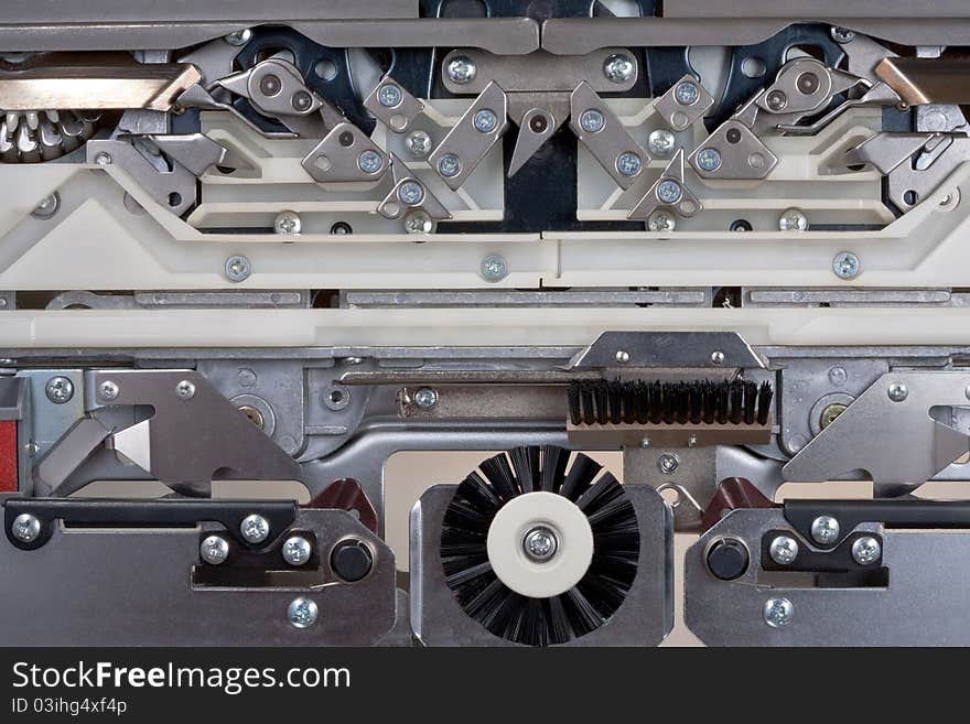 Lace carriage steel mechanism closeup. Lace carriage steel mechanism closeup