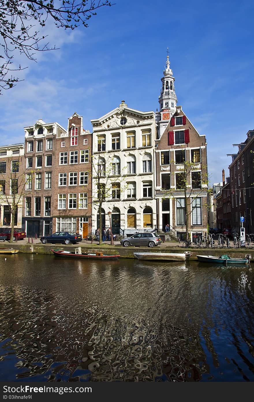 Amsterdam Life. Residential homes on the canal. Urban scene. Spring.