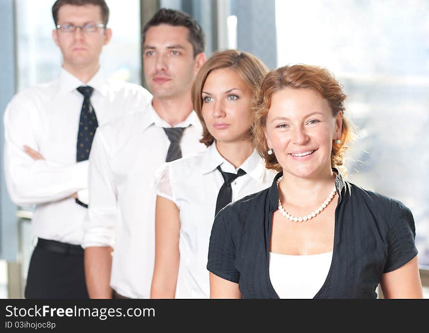 Group of officce workers posing for camera