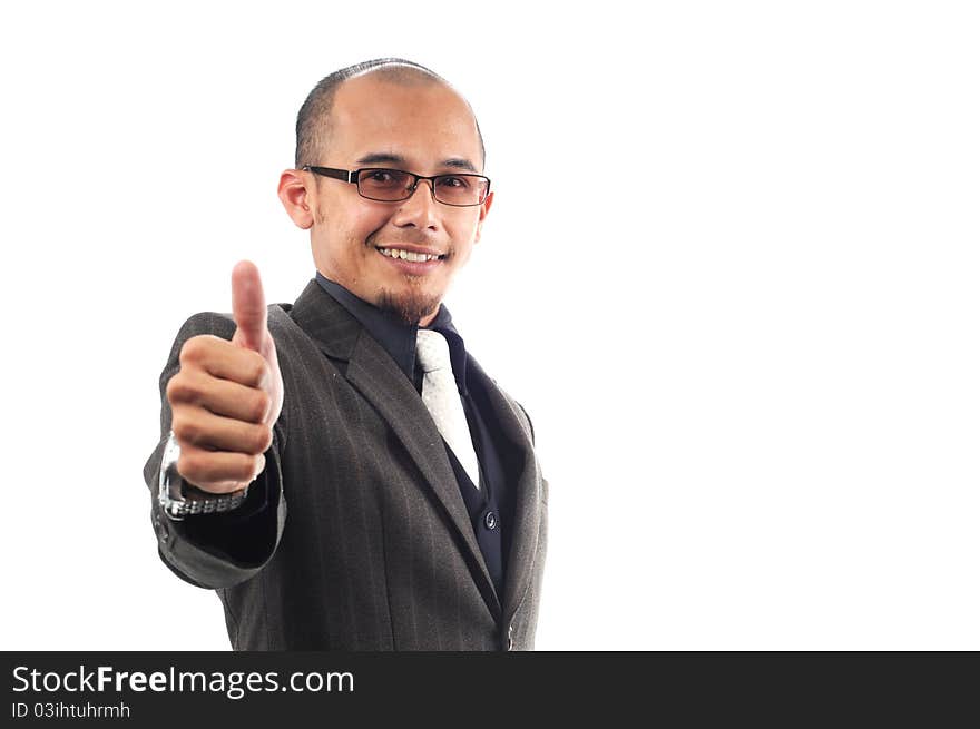 Happy businessman shows two thumbs up