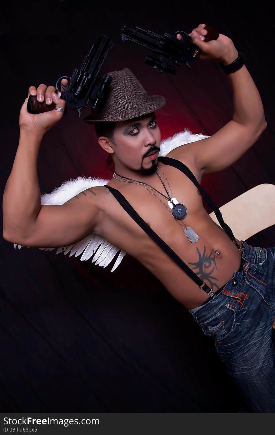 Asian Modeling with Two Guns Wearing a Suspenders and White Angel Wings