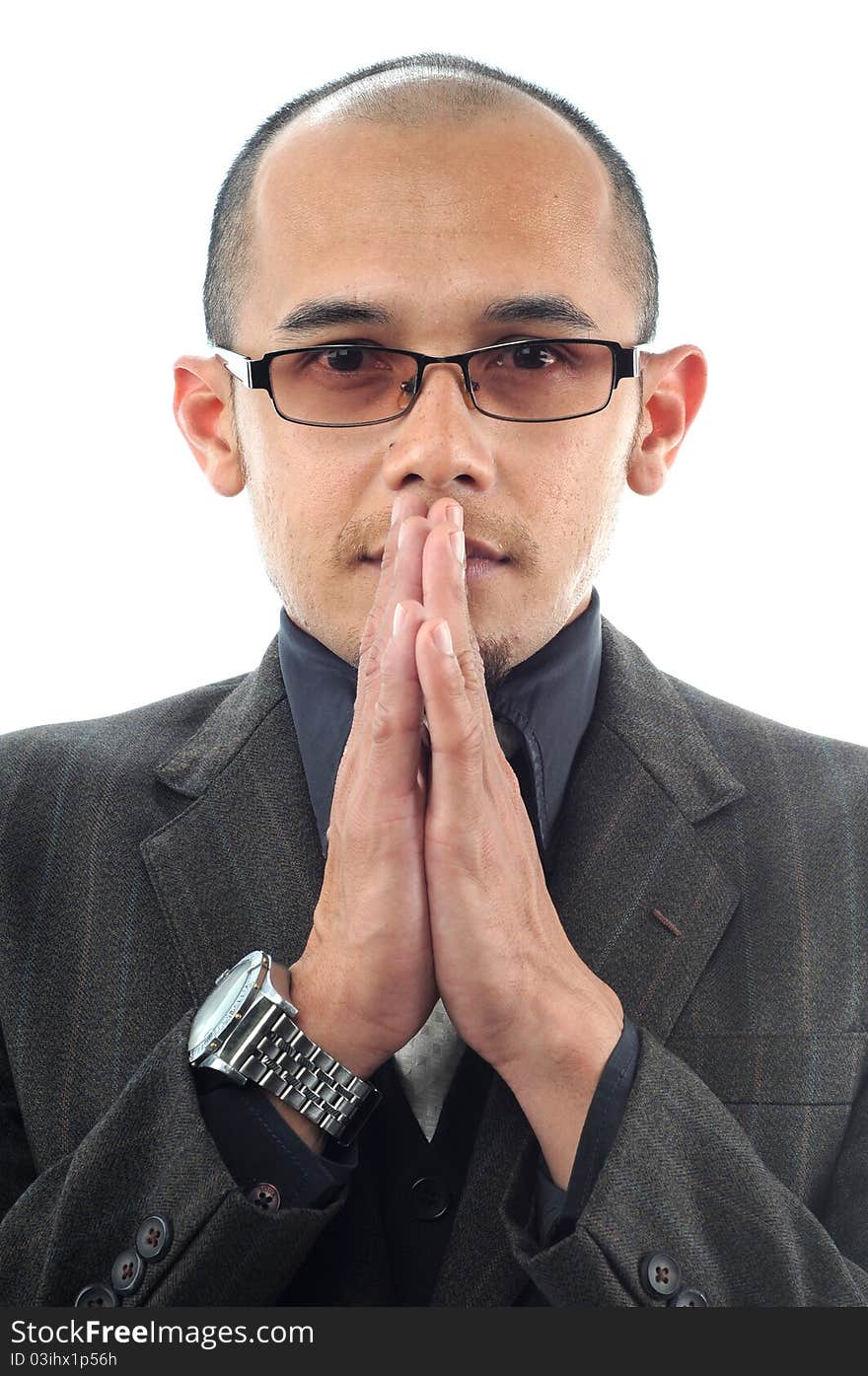 Potraiture of businessman calmly thinking isolated white background