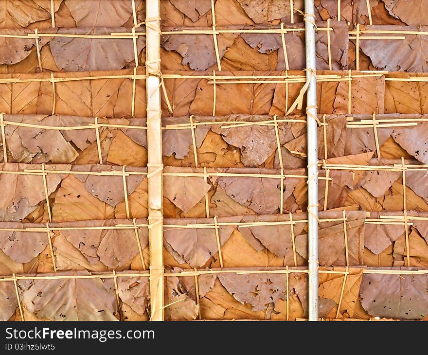 Roof made ​​of leaves background. Roof made ​​of leaves background