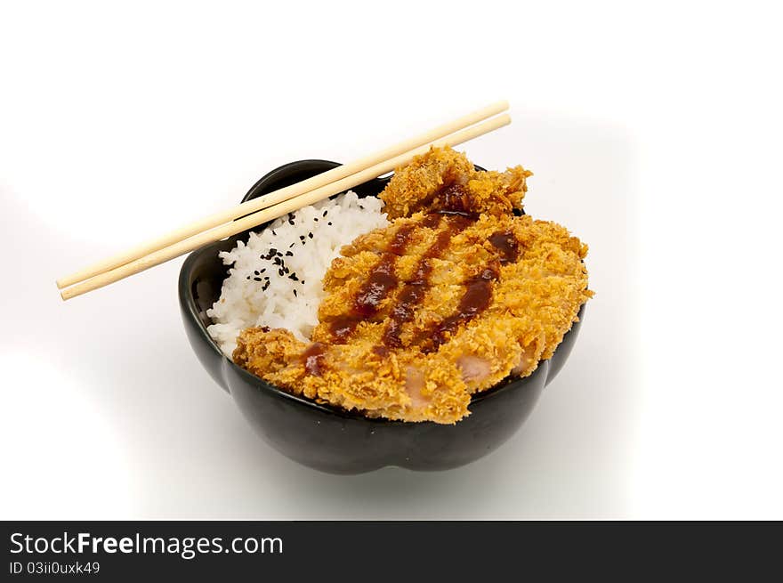 Rice and fried pork cutlet with japanese sweet sauce