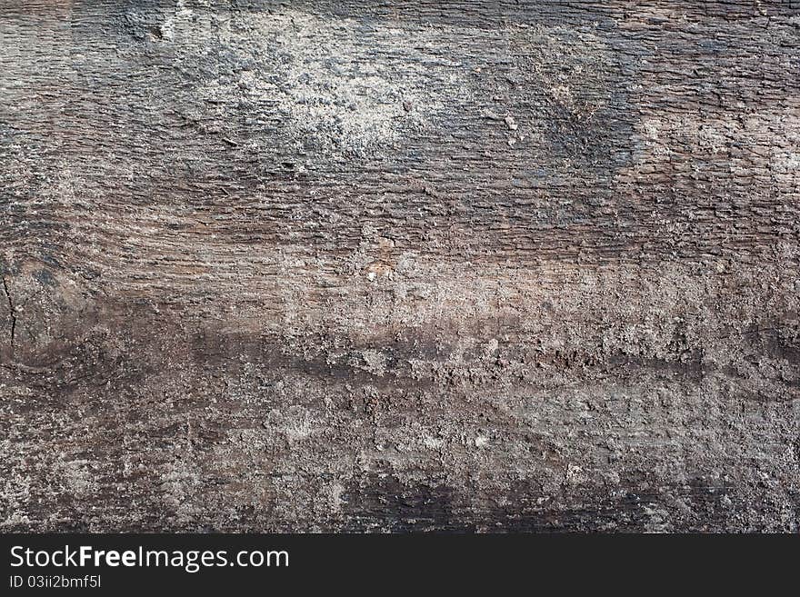 Pattern of old timber in sand