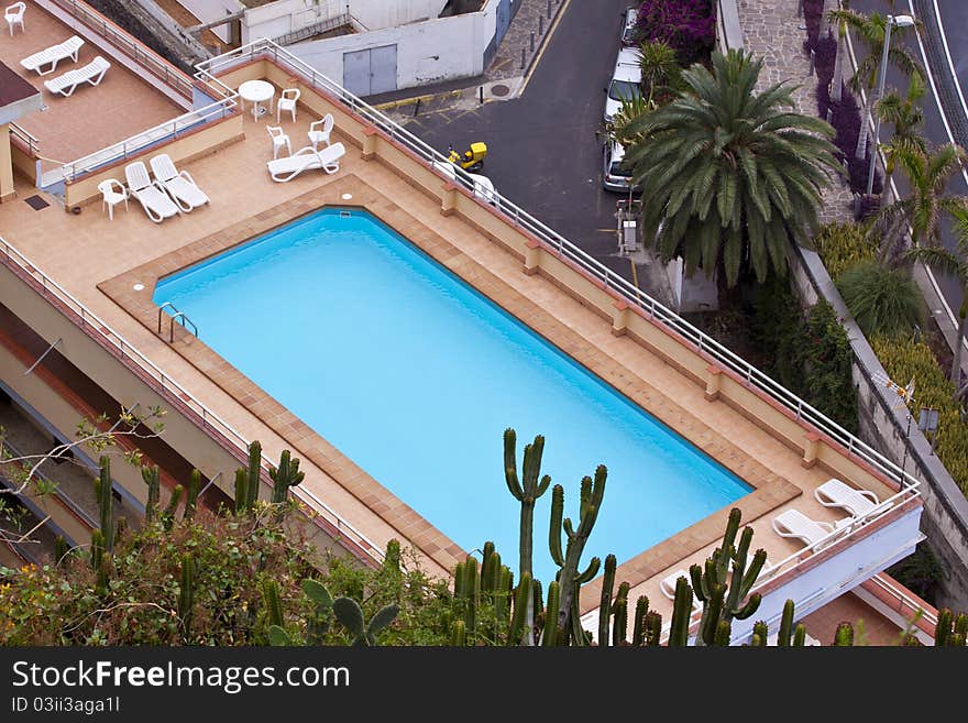 Swimming pool on top of a resort. Swimming pool on top of a resort