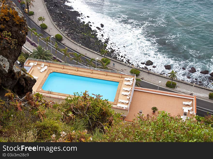 Swimming pool on top of a resort. Swimming pool on top of a resort