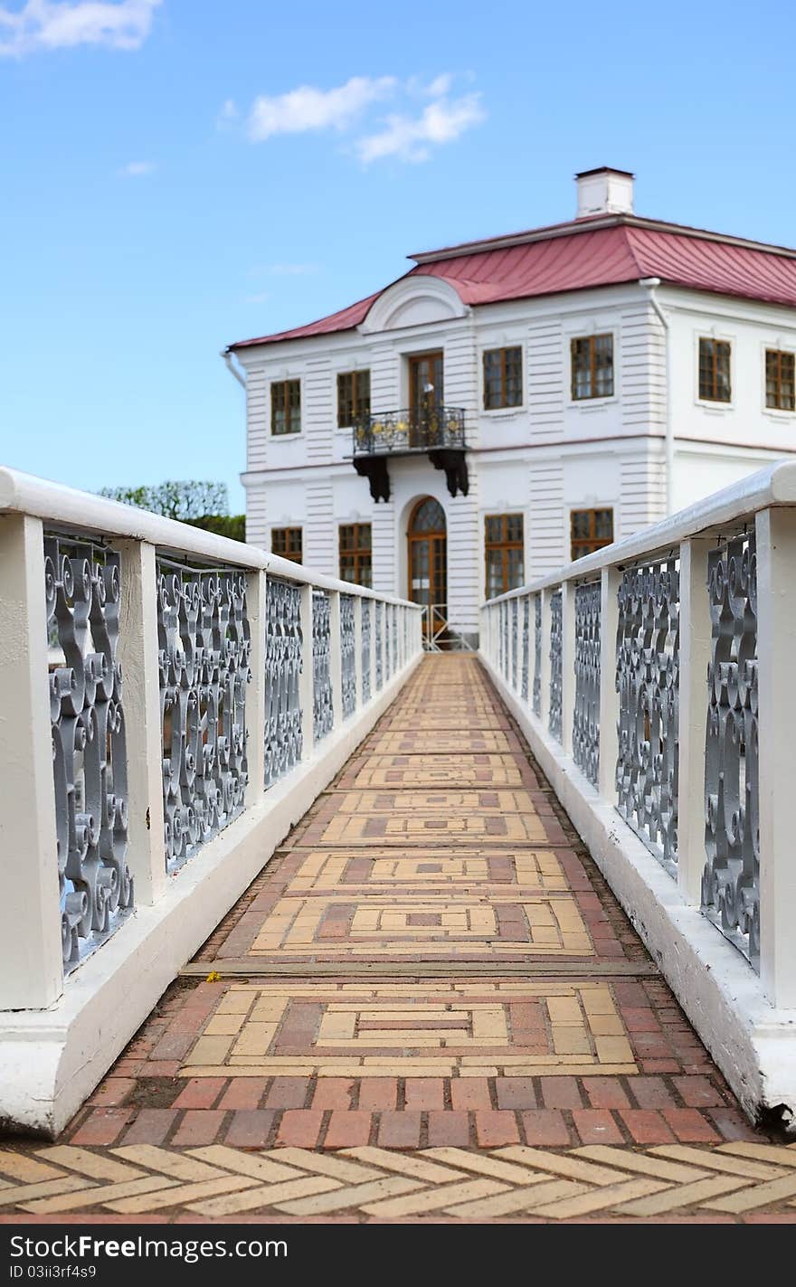 Old footbridge leading to the medieval mansion