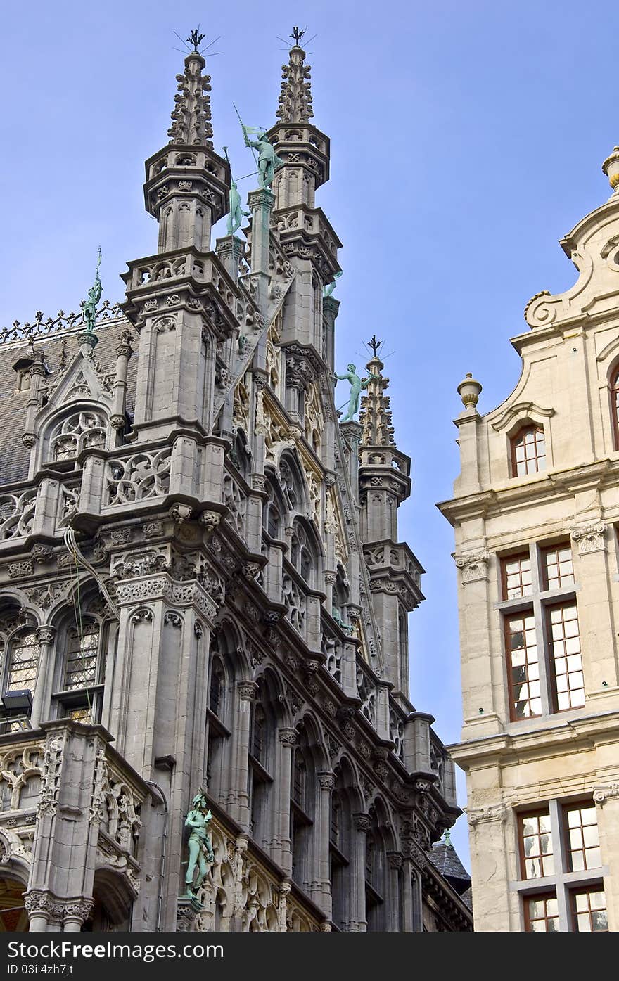 Architecture of Brussels. Ancient houses in the town square. Fragment. Spring, daylight.