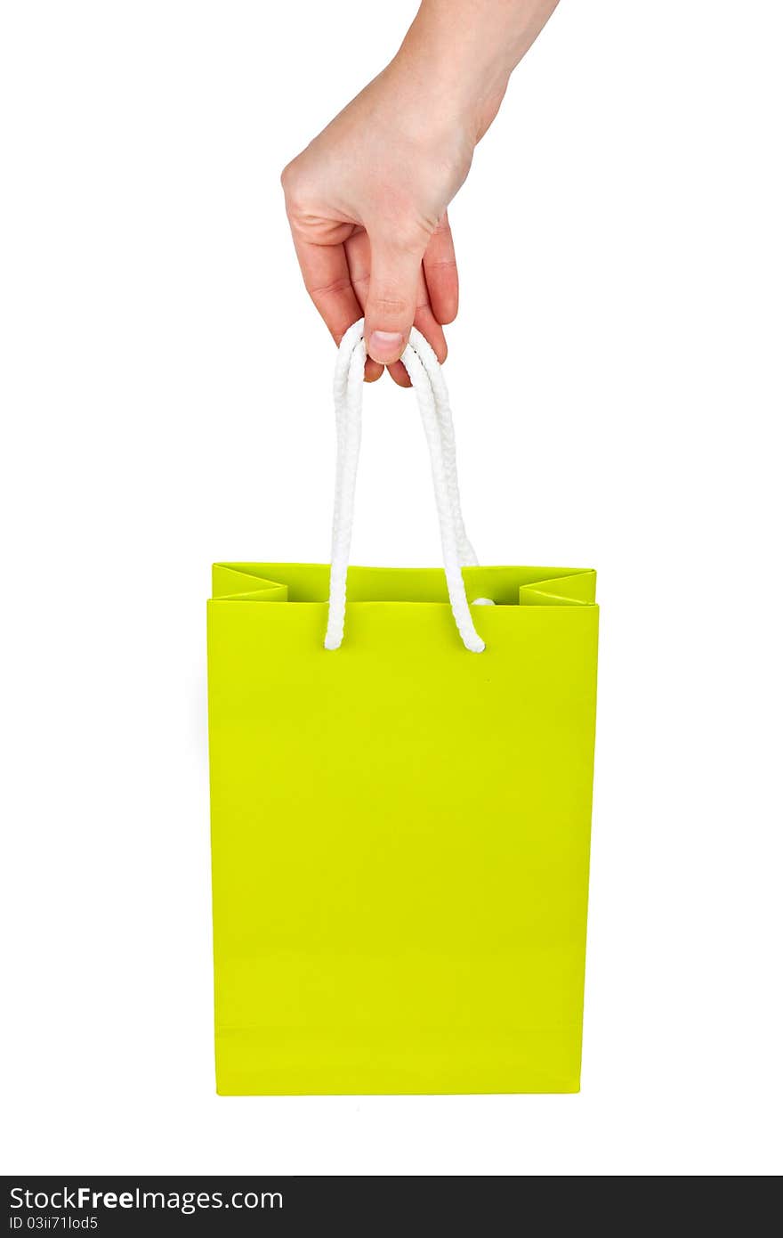 Hand with green bag