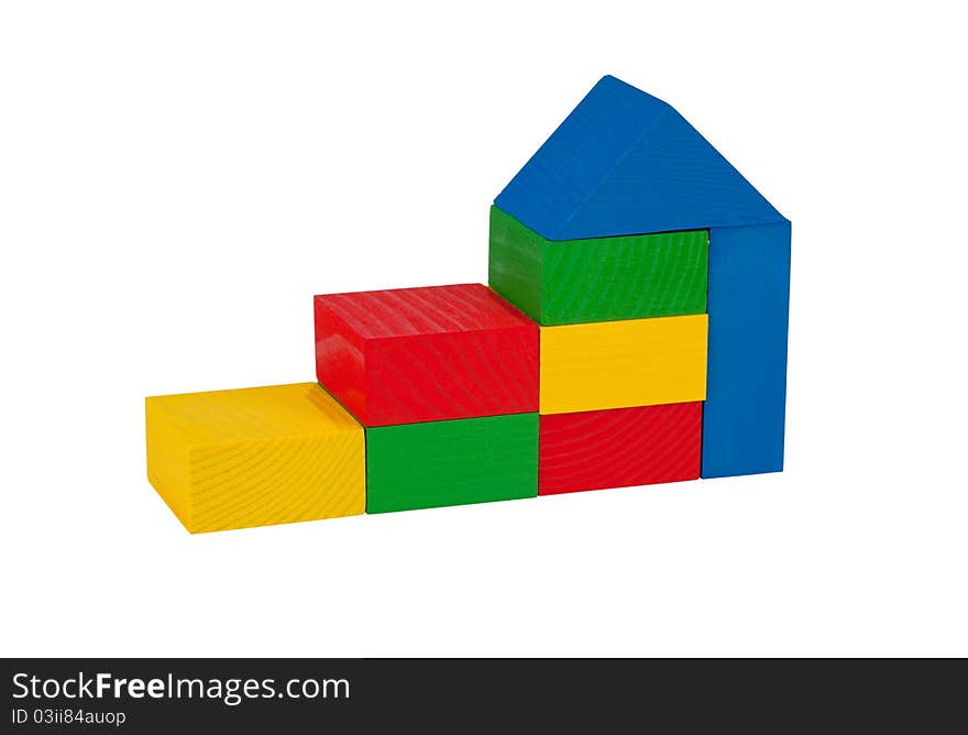 The construction of children's wooden blocks, isolated on a white background. The construction of children's wooden blocks, isolated on a white background.