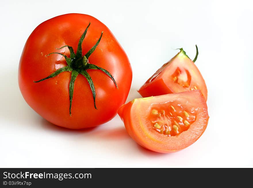 Isolated tomato on a white background. Isolated tomato on a white background